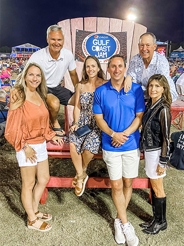 Photo of the firm's legal professionals as a sponsor of Gulf Coast Jam. This was the first major music festival in the world since the pandemic.